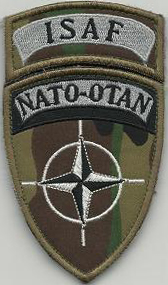 Нарукавный знак миротворческих сил НАТО (ISAF NATO-OTAN) использованные литовскими военнослужащими