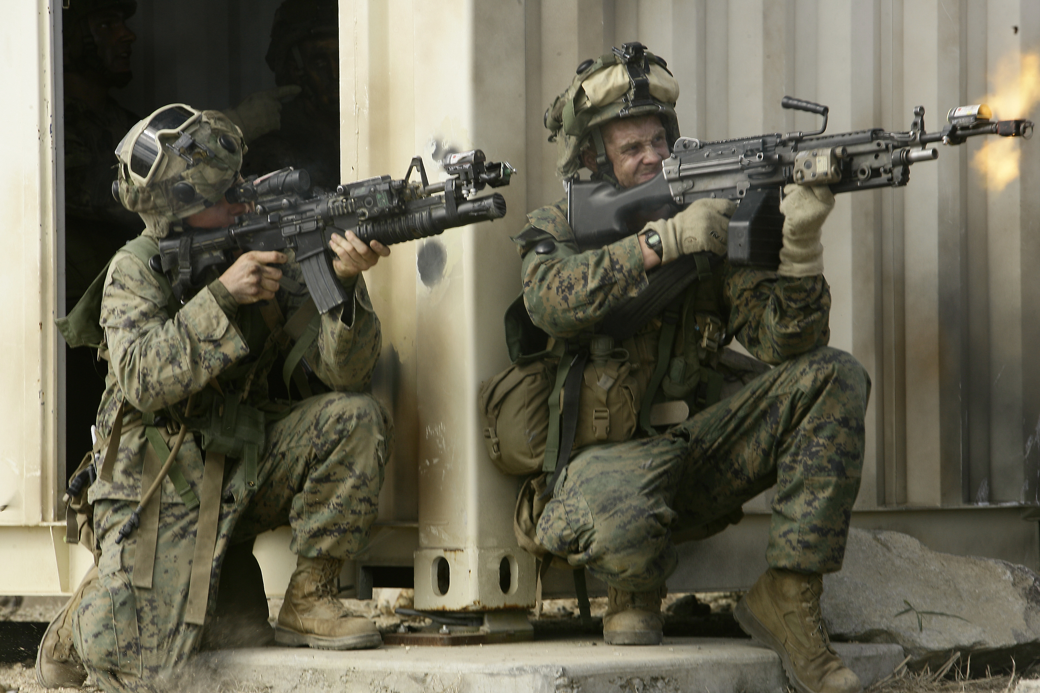 US Navy 090722-M-9065A-098 United States Marines with 3rd Battalion, 5th Marine Regiment, 31st Marine Expeditionary Unit, return fire with blank rounds at the Urban Operations Training Facility (UOTF).jpg